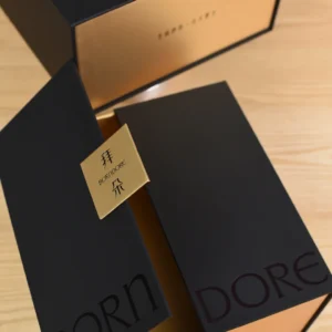 Luxury double door magnetic gift box in black and gold with premium rigid structure and metal logo plate