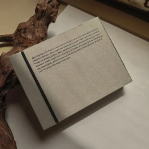 Grey board book style box packaging for premium products