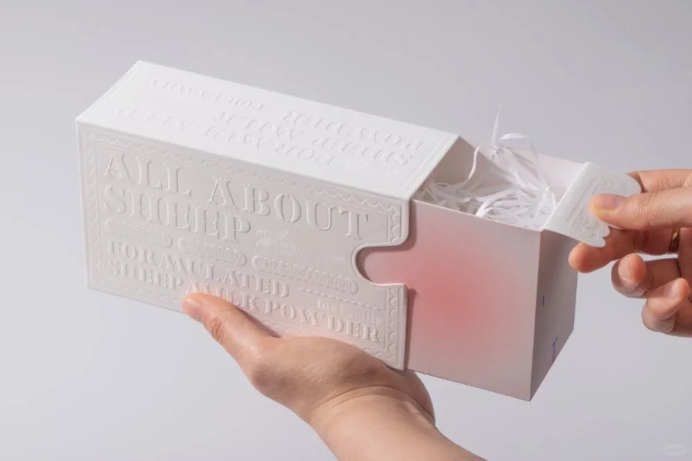 Luxury drawer gift box with embossed surface and sliding pull out design