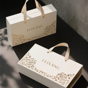Product 3 Luxury book style magnetic gift packaging box with handle and floral cutout design