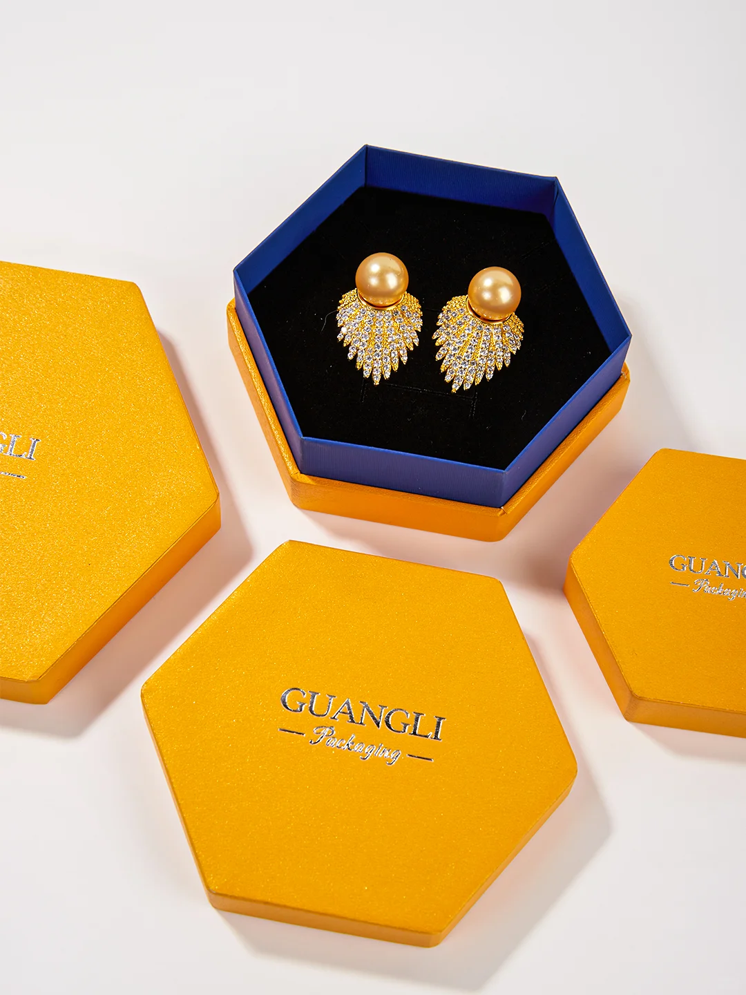 Luxury gold hexagon jewelry box with velvet insert for earrings and necklace packaging